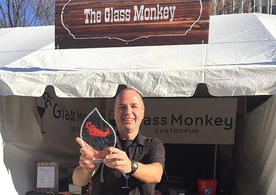 Glass Monkey owner Rob Filipchuk with chili trophy