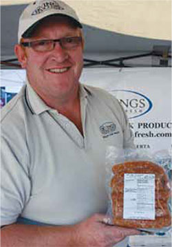 Alan Irving selling sausage at City Market Downtown
