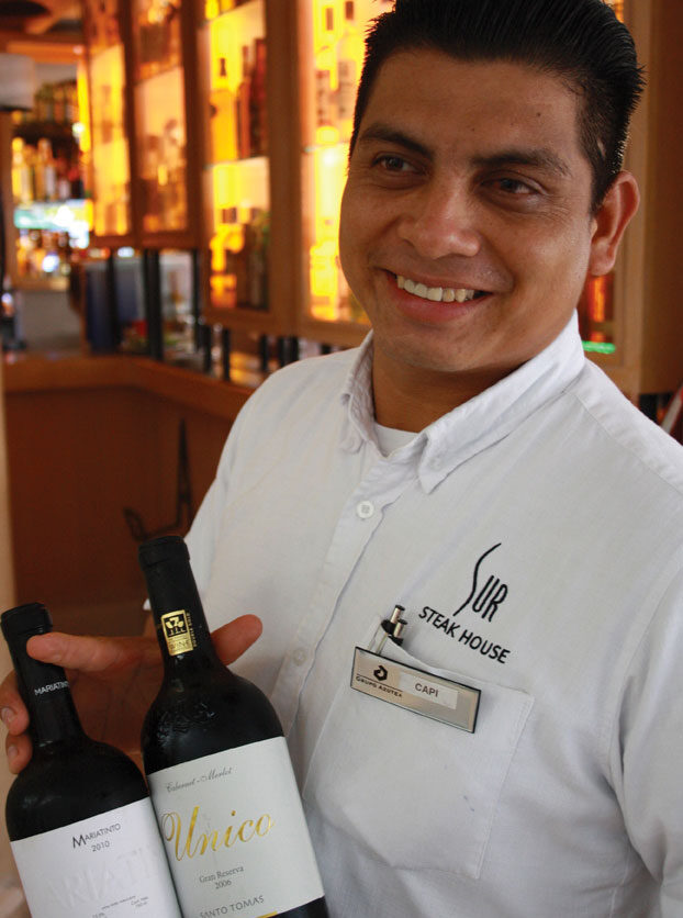 Sur's wine manager, Capi, shows off his favourite Mexican wines