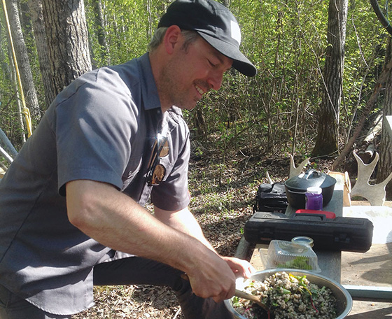 Blair Lebsack prepares salad at the Cook It Raw event held this summer at Lac la Biche
