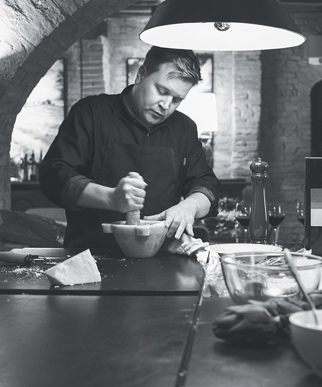 Daniel preps in the kitchen at Podere Panico.