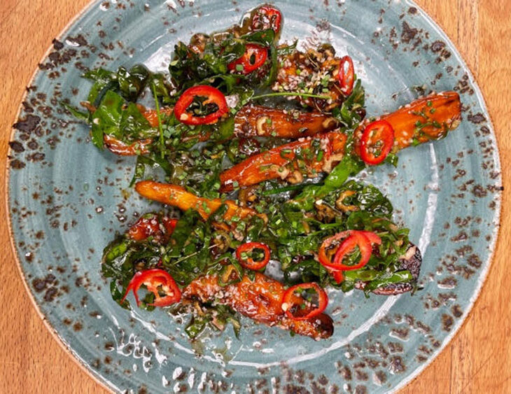 Glazed Carrots in Beef Stock with Swiss Chard, Cayenne and Hemp Seeds