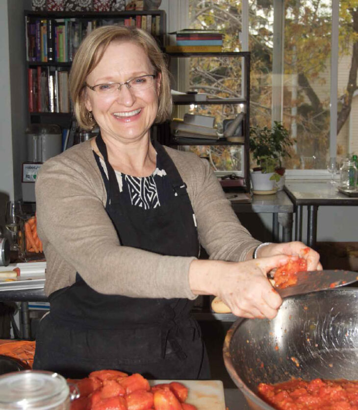 Donna Wynn makes tomato sauce. Mary Bailey photo.