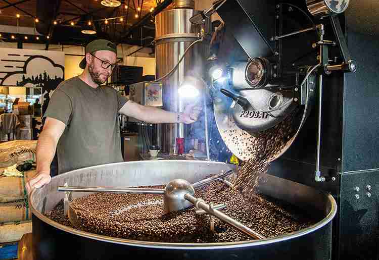 Roastie Coffee’s Andrew Hayes roasting beans